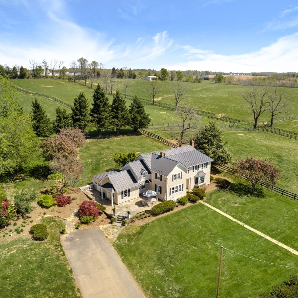 An aerial view of Still Meadow Farm, a renovated estate home in the Virginia countryside